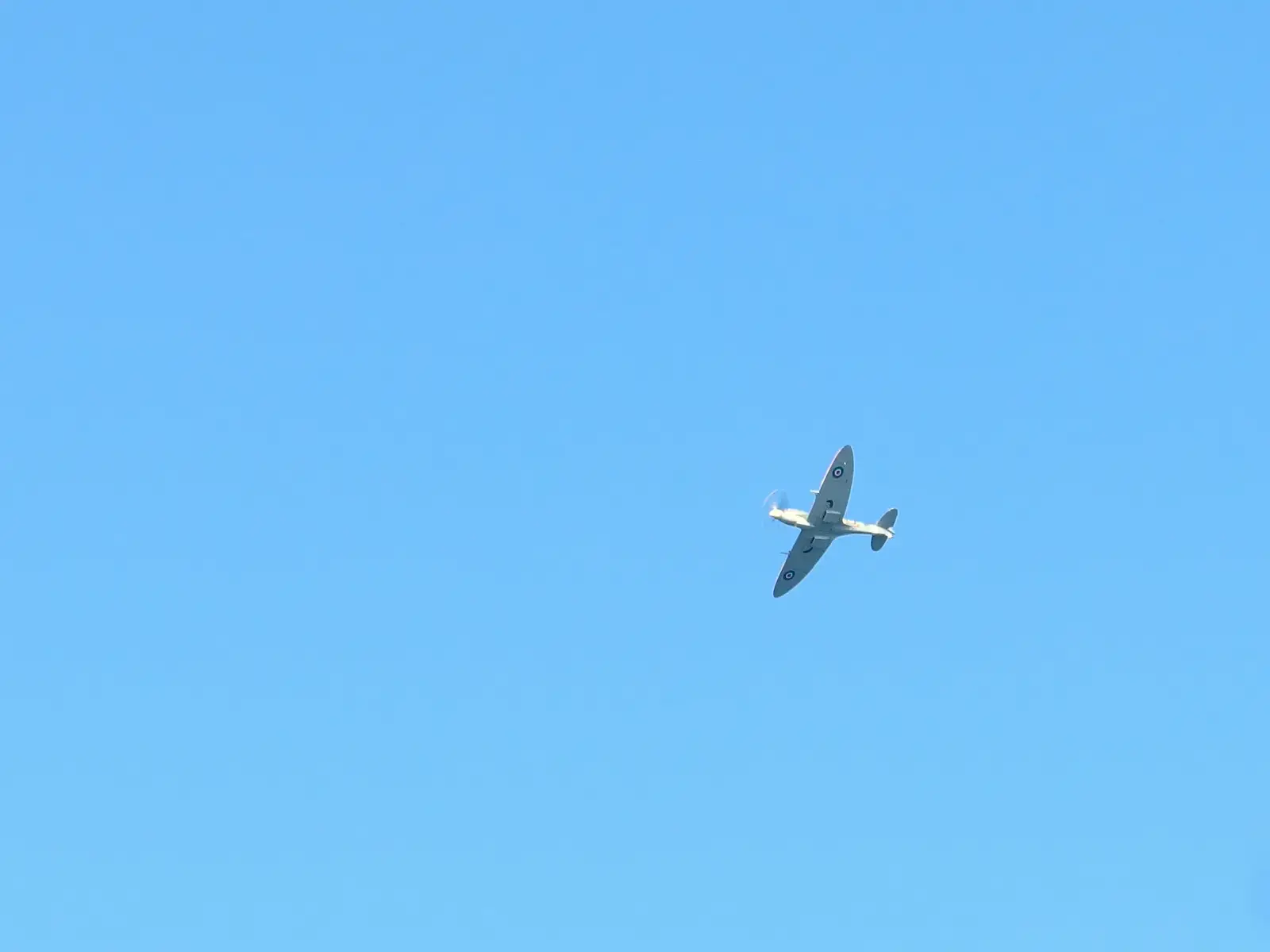 A Spitfire does a flypast, from Paul Bear's Adventures at a 1940s Steam Weekend, Holt, Norfolk - 22nd September 2013