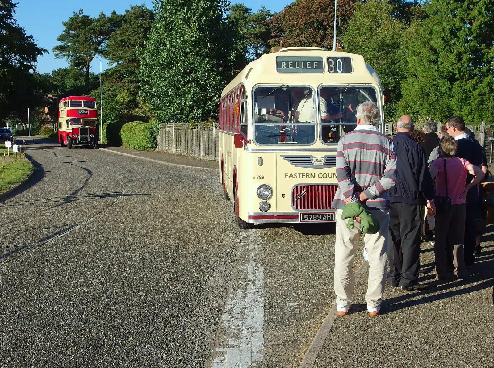 An old coach picks up passengers for Sheringham, from Paul Bear's Adventures at a 1940s Steam Weekend, Holt, Norfolk - 22nd September 2013