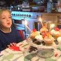 Fred blows out cupcake candles, Fred's Fifth Birthday, The Village Hall, Brome, Suffolk - 28th September 2013