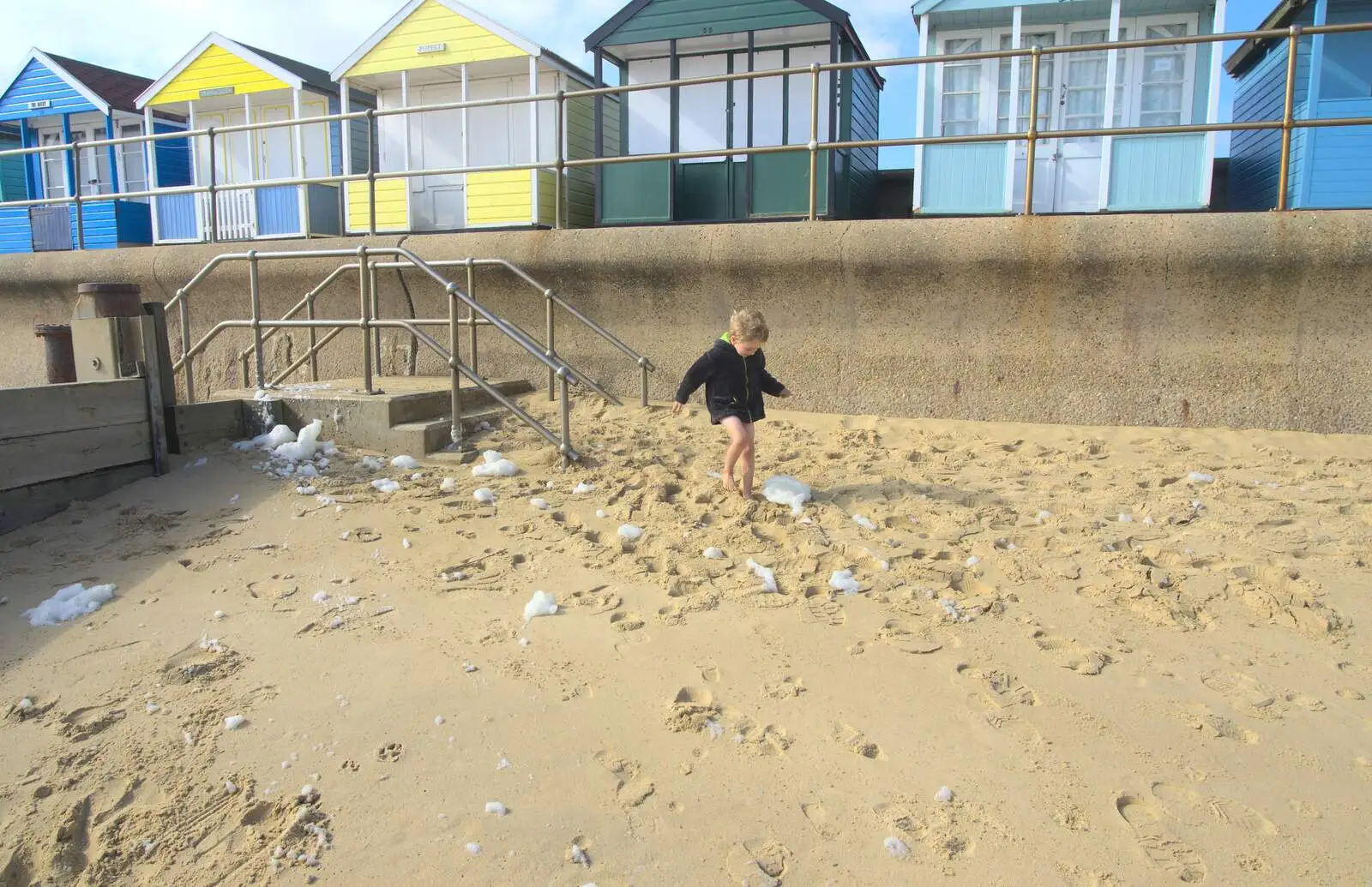 Fred kicks some foam about, from Southwold By The Sea, Suffolk - 29th September 2013