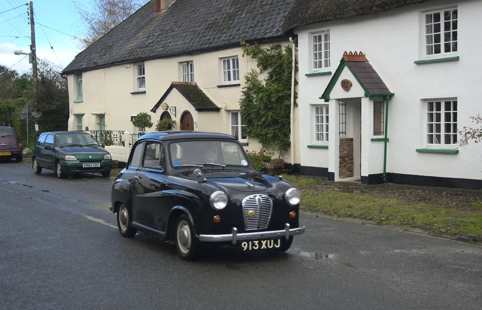 An Austin A35 drives through Spreyton, from A Few Days in Spreyton, Devon - 26th October 2013