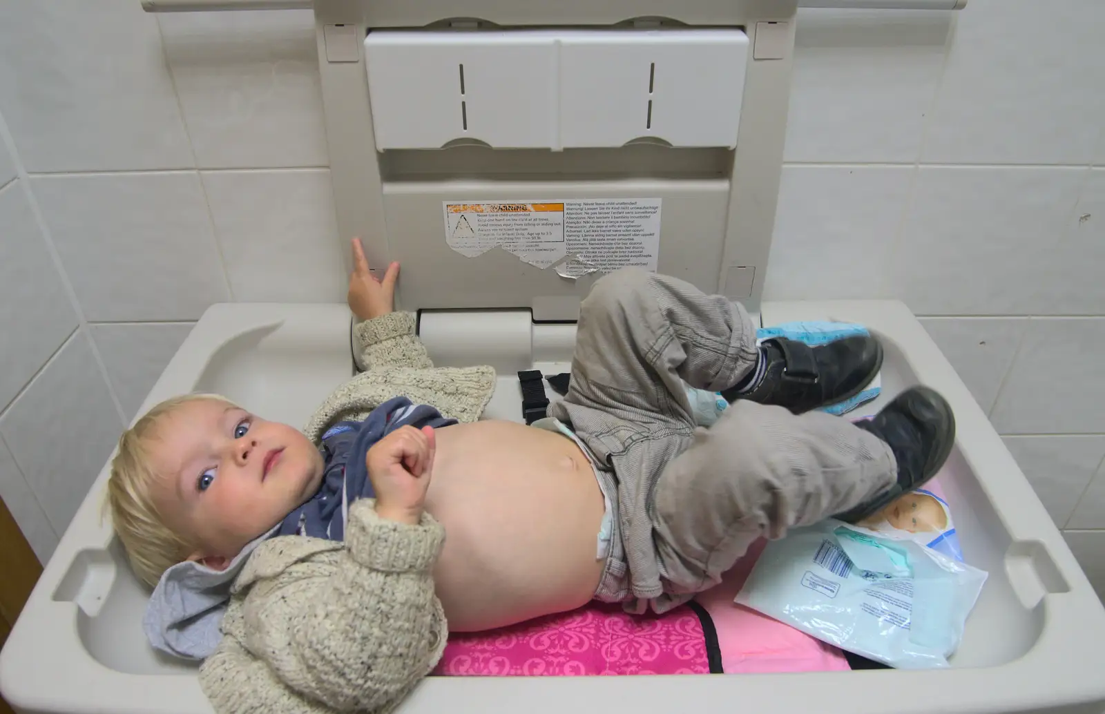 Harry wriggles on a changing table, from A Few Days in Spreyton, Devon - 26th October 2013