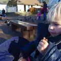 Harry eats a sausage by the Mere, More Building and Palgrave Playground, Suffolk - 24th November 2013