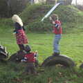 Milly, Harry and Fred mess around on the tyres, More Building and Palgrave Playground, Suffolk - 24th November 2013