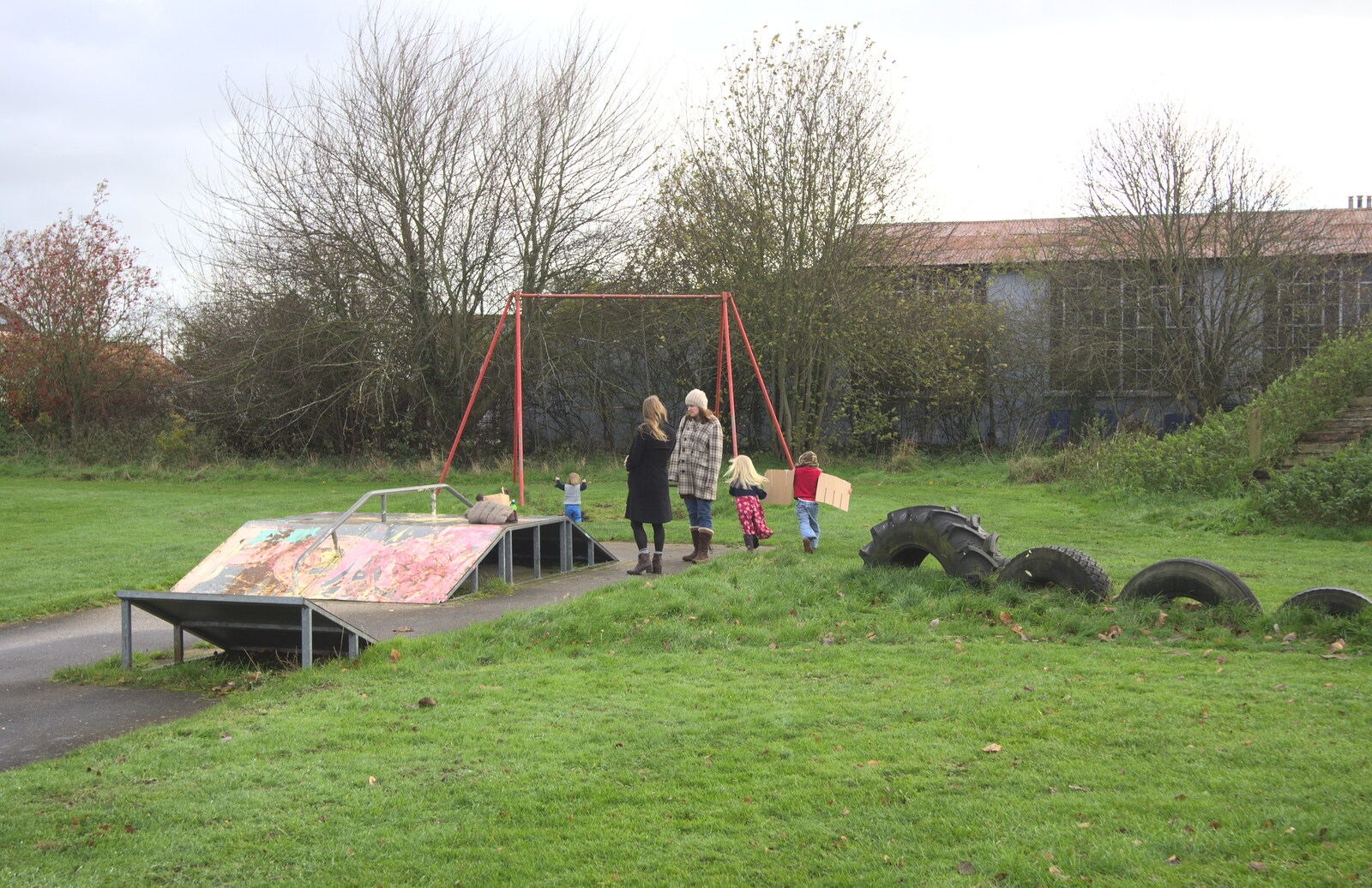 More Building and Palgrave Playground, Suffolk - 24th November 2013: Hannah and Isobel discuss the playground