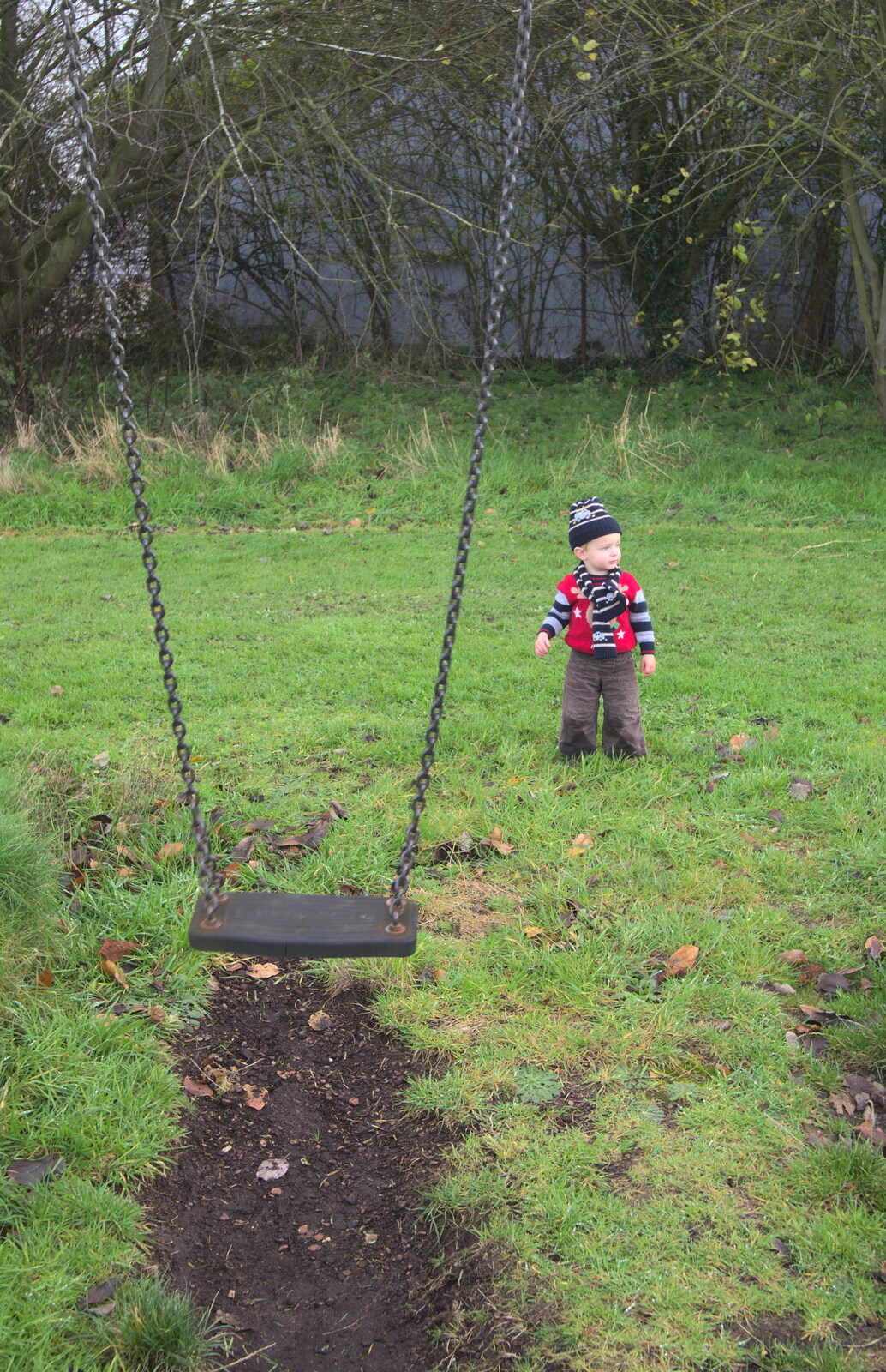 More Building and Palgrave Playground, Suffolk - 24th November 2013: Harry stands next to the swing