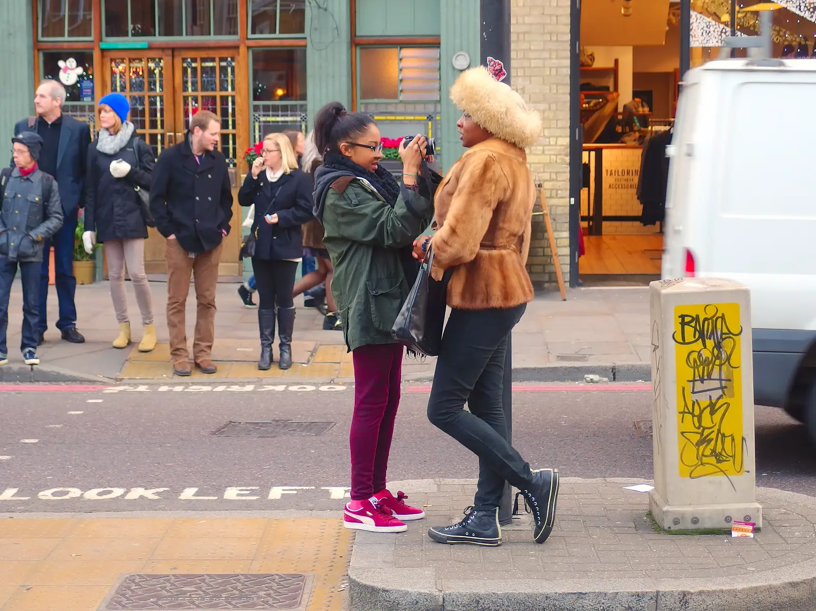 On Commercial Street, street photography occurs, from Lunch in the East End, Spitalfields and Brick Lane, London - 1st December 2013