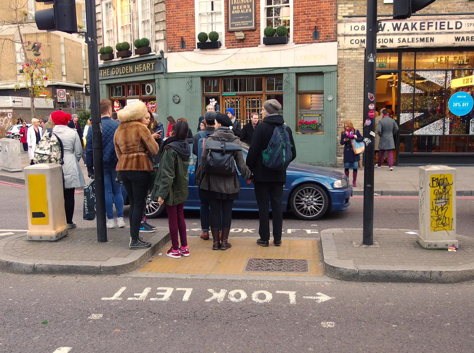 The ad-hoc photo shoot heads off, from Lunch in the East End, Spitalfields and Brick Lane, London - 1st December 2013