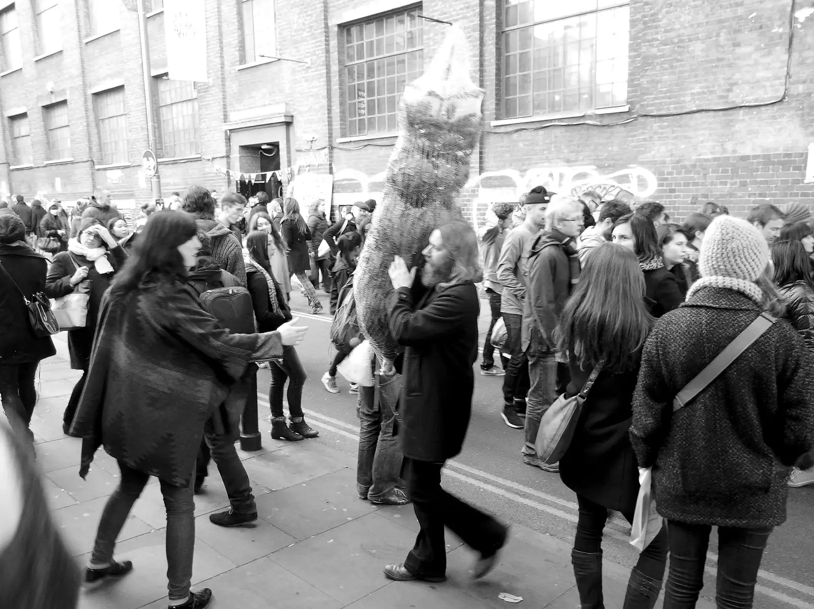 Some dude hauls a Christmas tree around, from Lunch in the East End, Spitalfields and Brick Lane, London - 1st December 2013