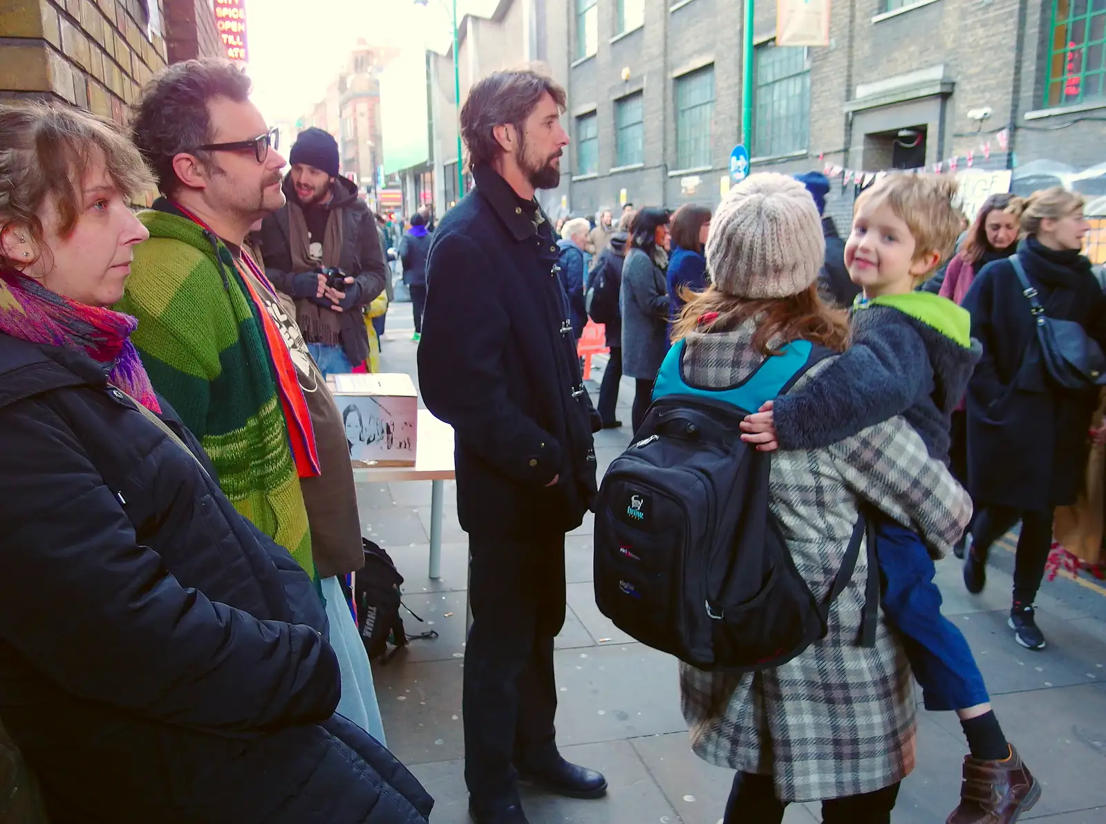 Fred looks back as Isobel carries him around, from Lunch in the East End, Spitalfields and Brick Lane, London - 1st December 2013