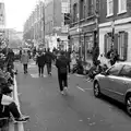 People hang around off Brick Lane just eating food, Lunch in the East End, Spitalfields and Brick Lane, London - 1st December 2013