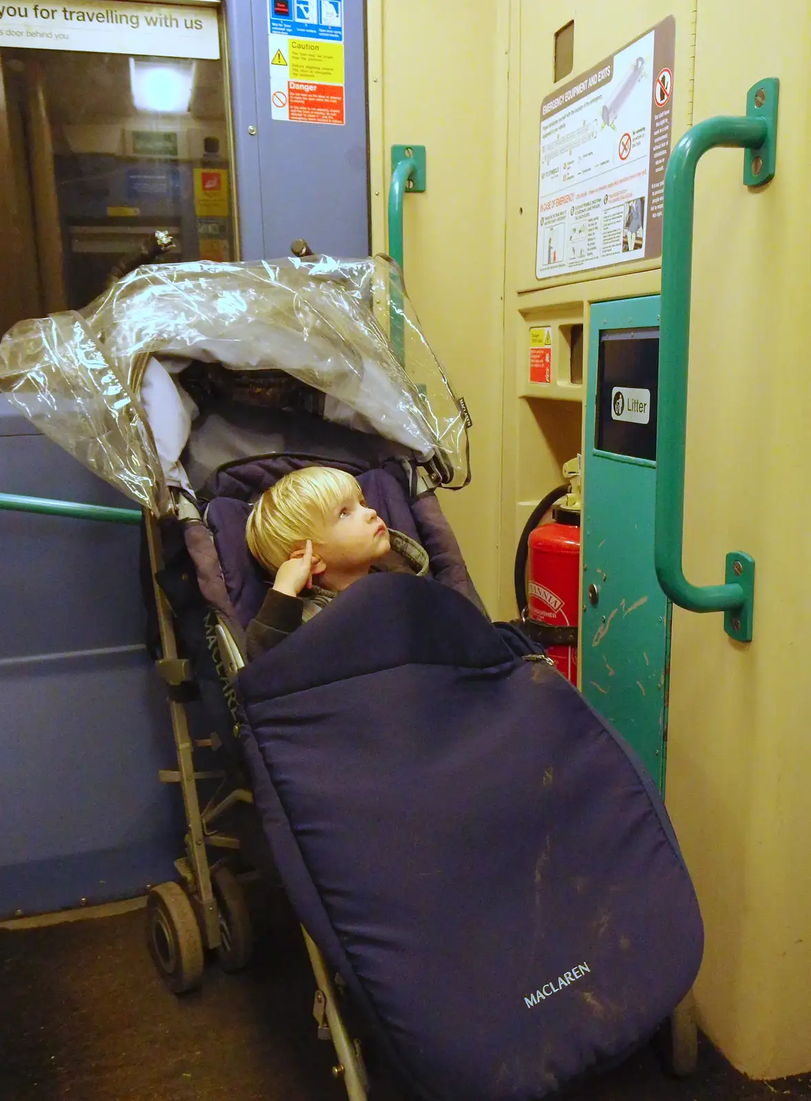 Harry peers around in a Mark 3 coach vestibule, from Lunch in the East End, Spitalfields and Brick Lane, London - 1st December 2013