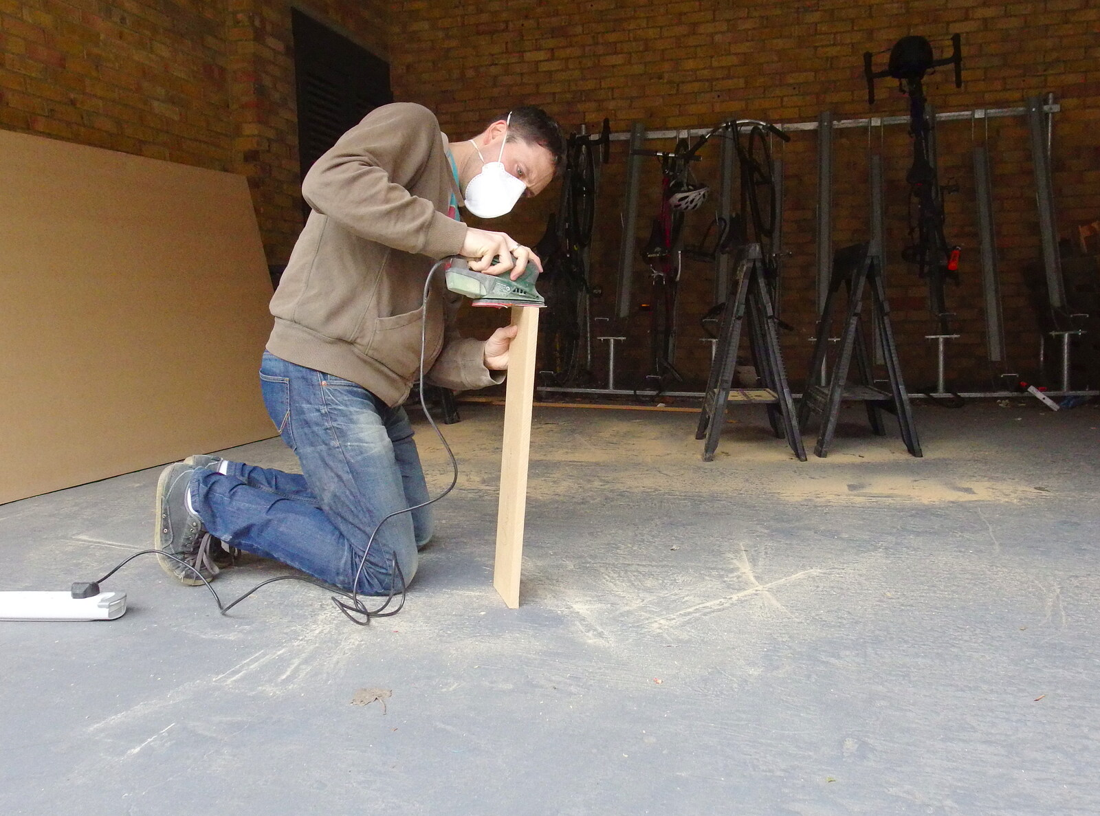 SwiftKey's Arcade Cabinet, and the Streets of Southwark, London - 5th December 2013: Emlyn does some sanding