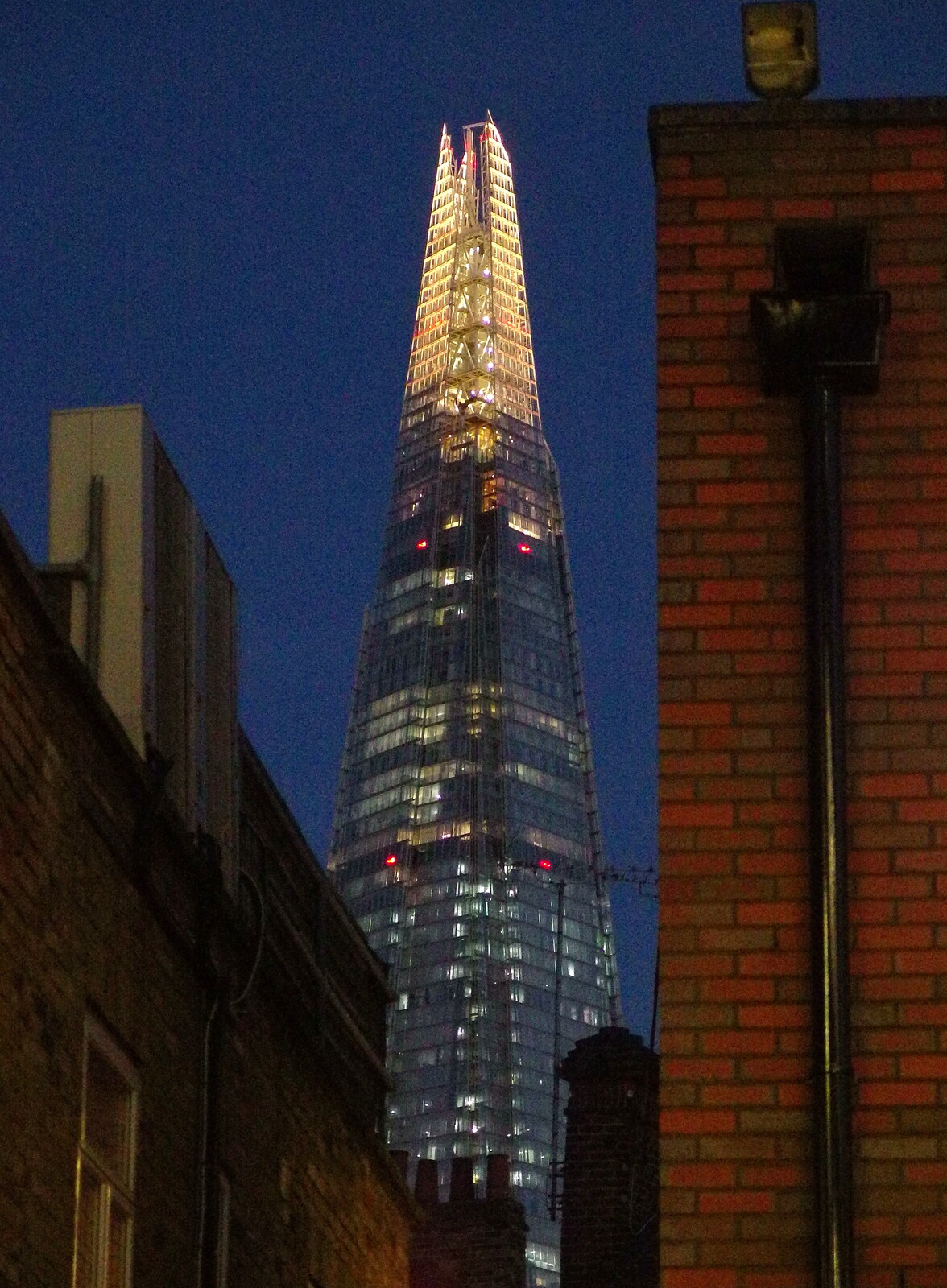 SwiftKey's Arcade Cabinet, and the Streets of Southwark, London - 5th December 2013: The Shard, lit up in the dusk