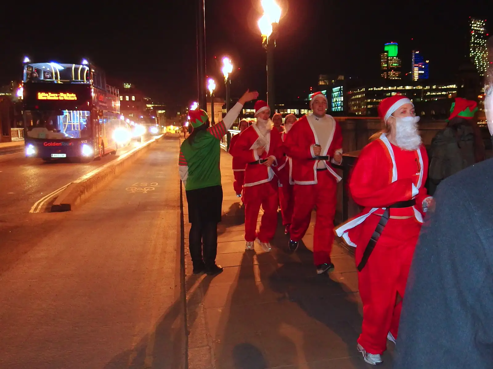 A load of Santas run across Southwark Bridge, from SwiftKey's Arcade Cabinet, and the Streets of Southwark, London - 5th December 2013