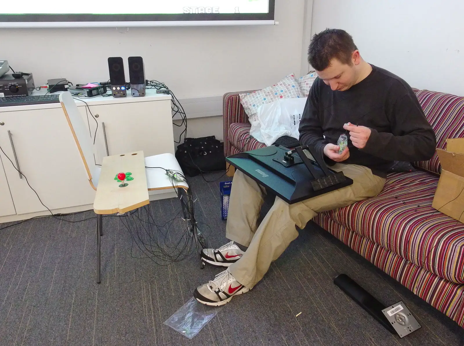 Joe works on a monitor, from SwiftKey's Arcade Cabinet, and the Streets of Southwark, London - 5th December 2013