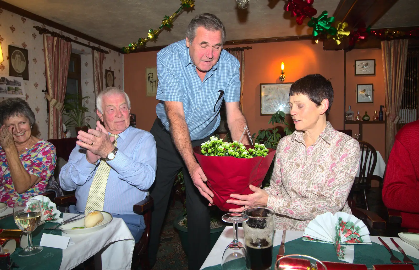 Alan gives Pippa some flowers, from The BSCC Christmas Dinner, Brome, Suffolk - 7th December 2013