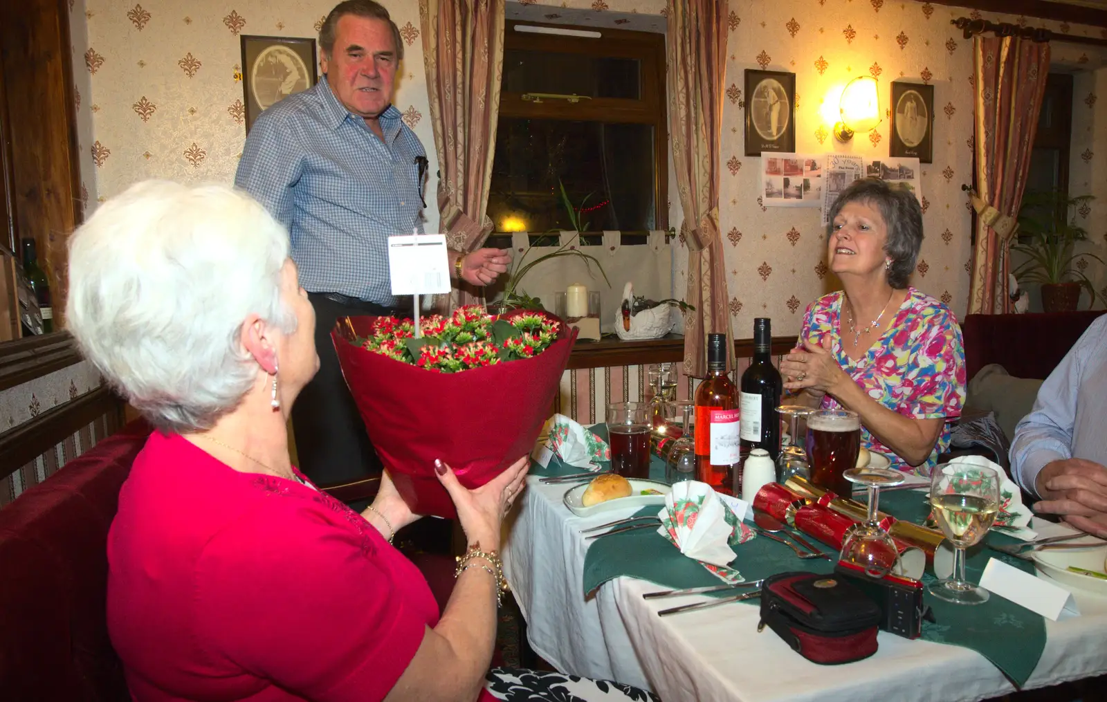 Spammy gets a plant, from The BSCC Christmas Dinner, Brome, Suffolk - 7th December 2013