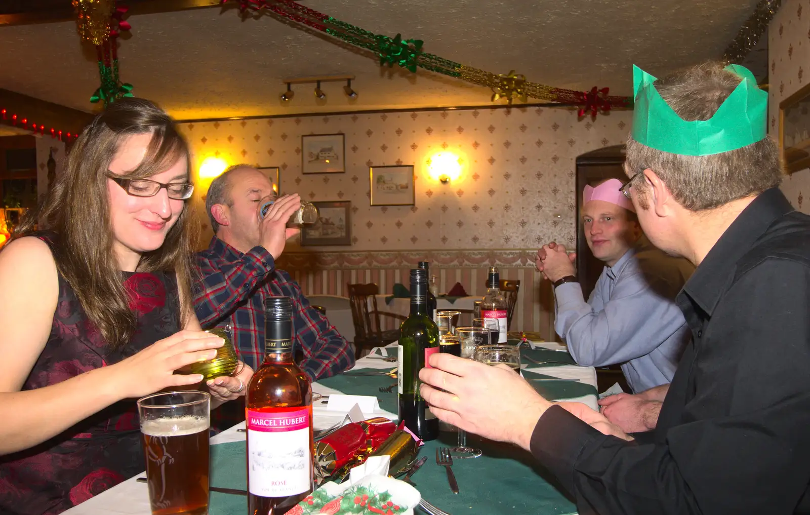 Suey lights a candle, from The BSCC Christmas Dinner, Brome, Suffolk - 7th December 2013