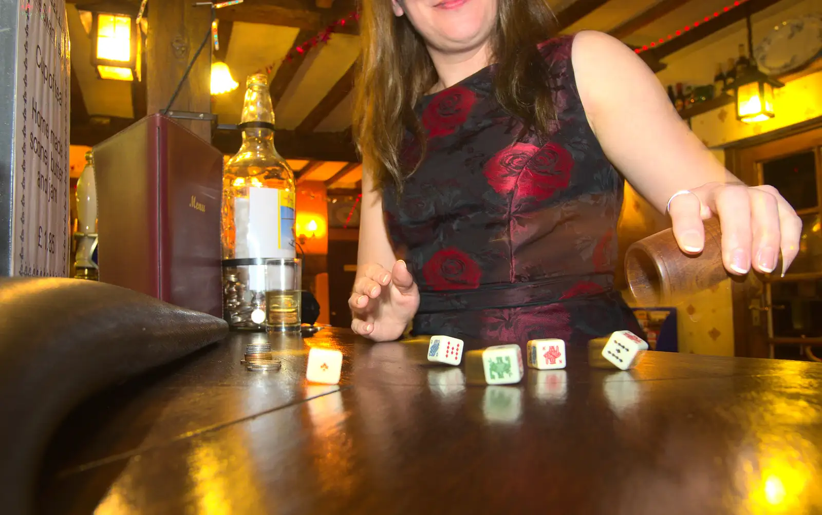 Suey plays dice, from The BSCC Christmas Dinner, Brome, Suffolk - 7th December 2013