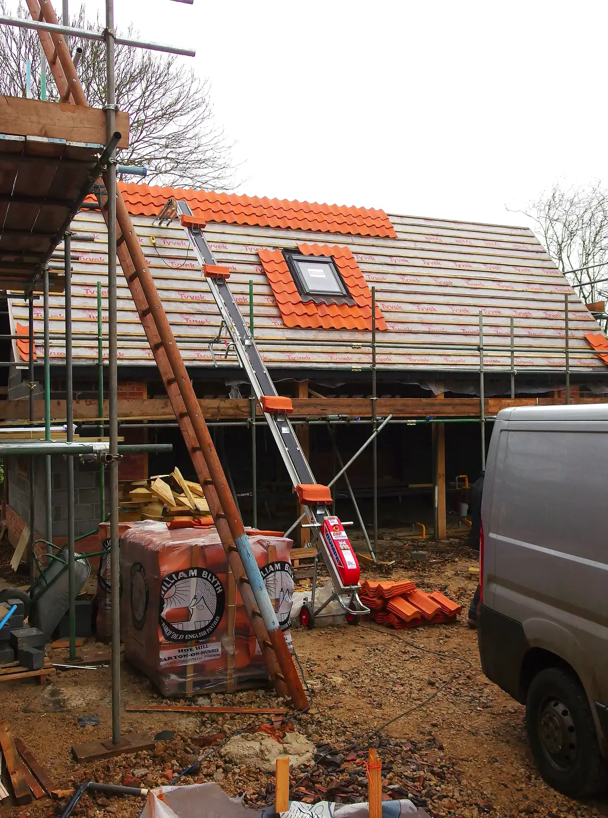 The new garage gets some tiles on a conveyor, from Saturday Café Life, Diss, Norfolk - 14th December 2013