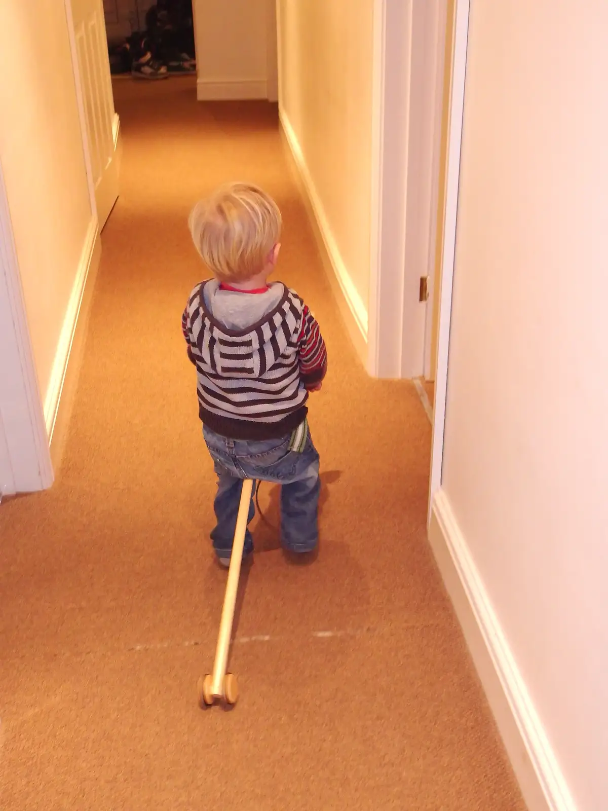 Harry has a go on the hobby horse, from A Christmas Party, Brome, Suffolk - 21st December 2013