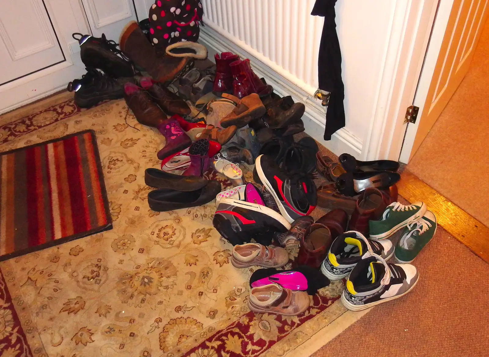 There's a small pile of shoes by the door, from A Christmas Party, Brome, Suffolk - 21st December 2013