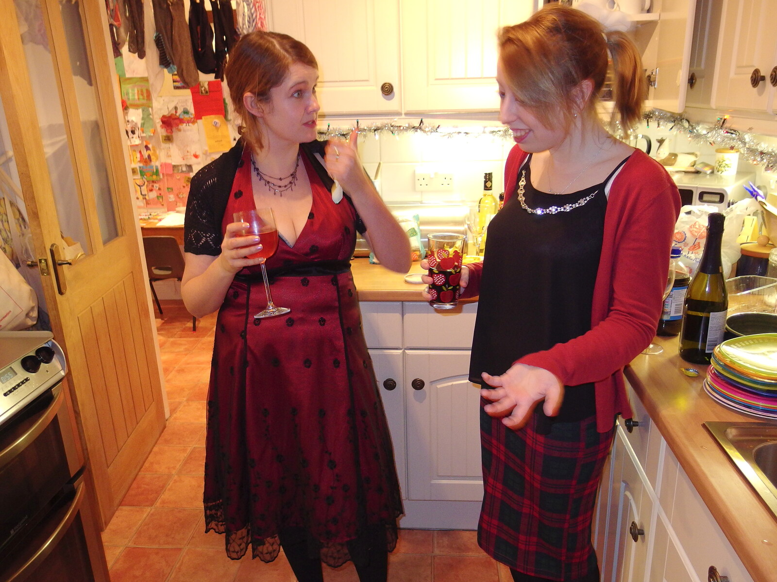 Isobel and Ellie in the kitchen from A Christmas Party, Brome, Suffolk - 21st December 2013