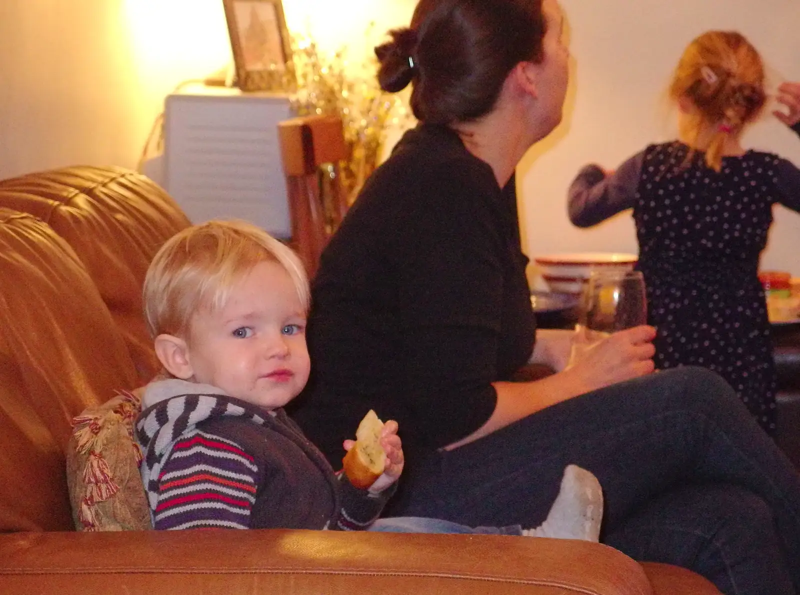 Harry eats garlic bread, from A Christmas Party, Brome, Suffolk - 21st December 2013