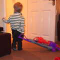 Jack looks up the corridor, with his hoover, A Christmas Party, Brome, Suffolk - 21st December 2013