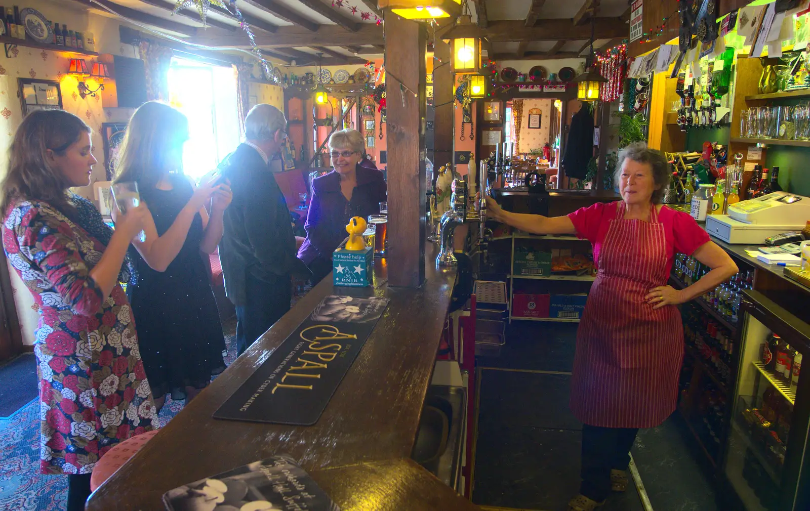 Sylvia behind the bar at The Swan, from Christmas Day and all that, Brome, Suffolk - 25th December 2013