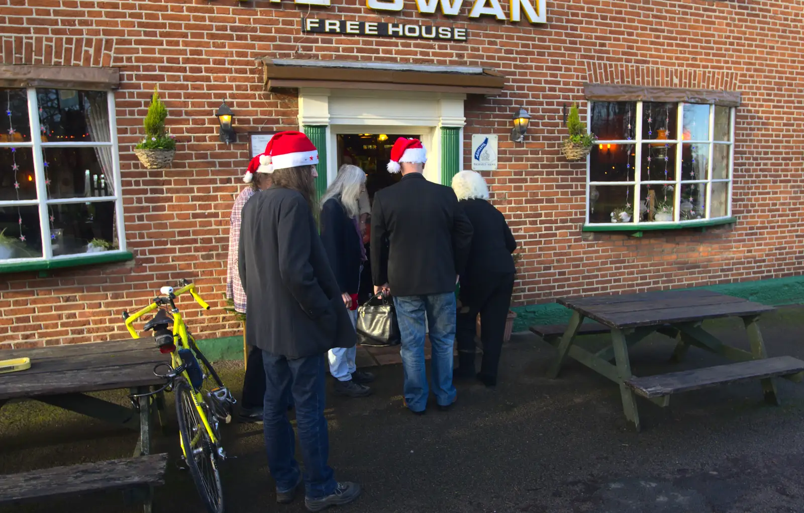 People with Santa hats on their way in, from Christmas Day and all that, Brome, Suffolk - 25th December 2013