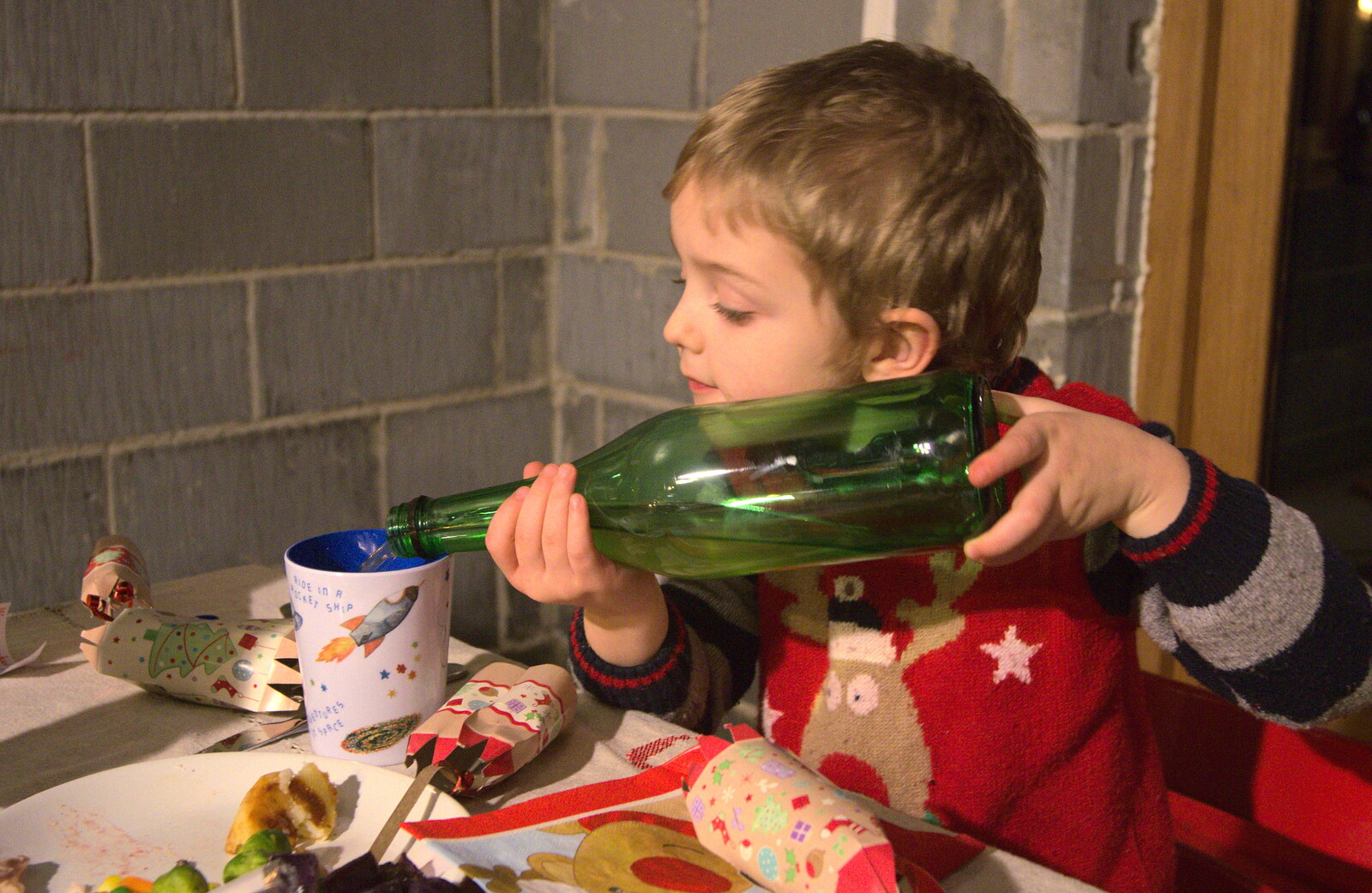 Fred pours a glass of apple juice from Christmas Day and all that, Brome, Suffolk - 25th December 2013