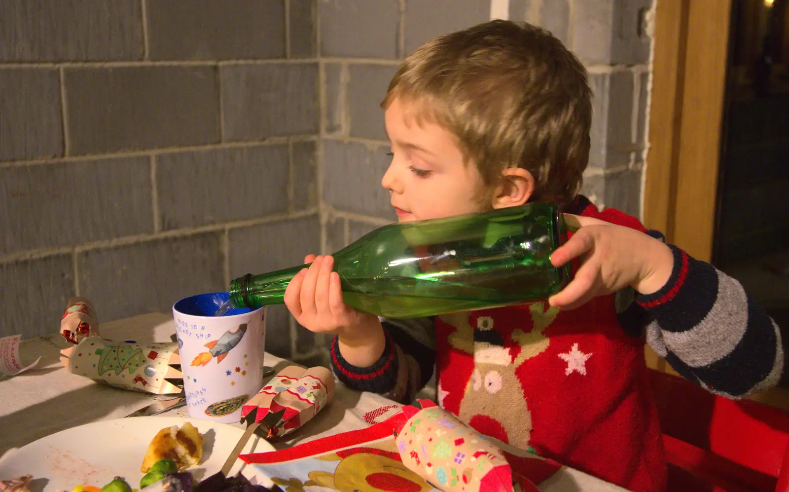 Fred pours a glass of apple juice, from Christmas Day and all that, Brome, Suffolk - 25th December 2013