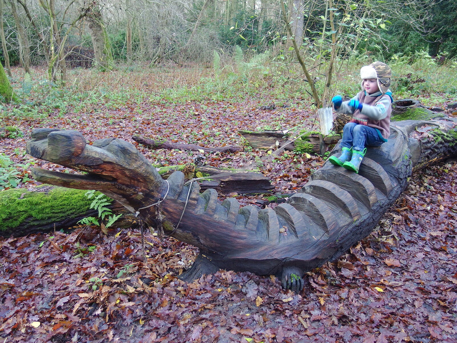 Fred rides the wooden dragon from A Boxing Day Walk, Thornham Estate, Suffolk - 26th December 2013