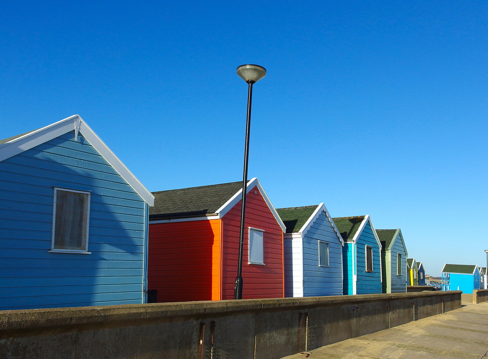 Colourful beach huts on the prom from Post-Christmas Southwold, Suffolk - 29th December 2013