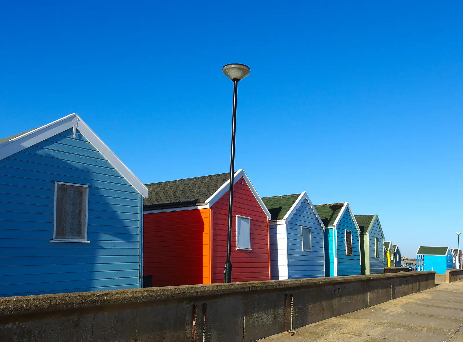 Colourful beach huts on the promenade, from Post-Christmas Southwold, Suffolk - 29th December 2013