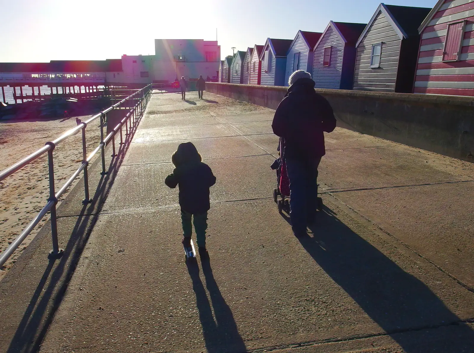 Fred and Isobel on the prom, contra jour, from Post-Christmas Southwold, Suffolk - 29th December 2013