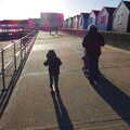 Fred and Isobel on the prom, contra jour, Post-Christmas Southwold, Suffolk - 29th December 2013