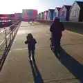 Fred and Isobel on the prom, contra jour, Post-Christmas Southwold, Suffolk - 29th December 2013