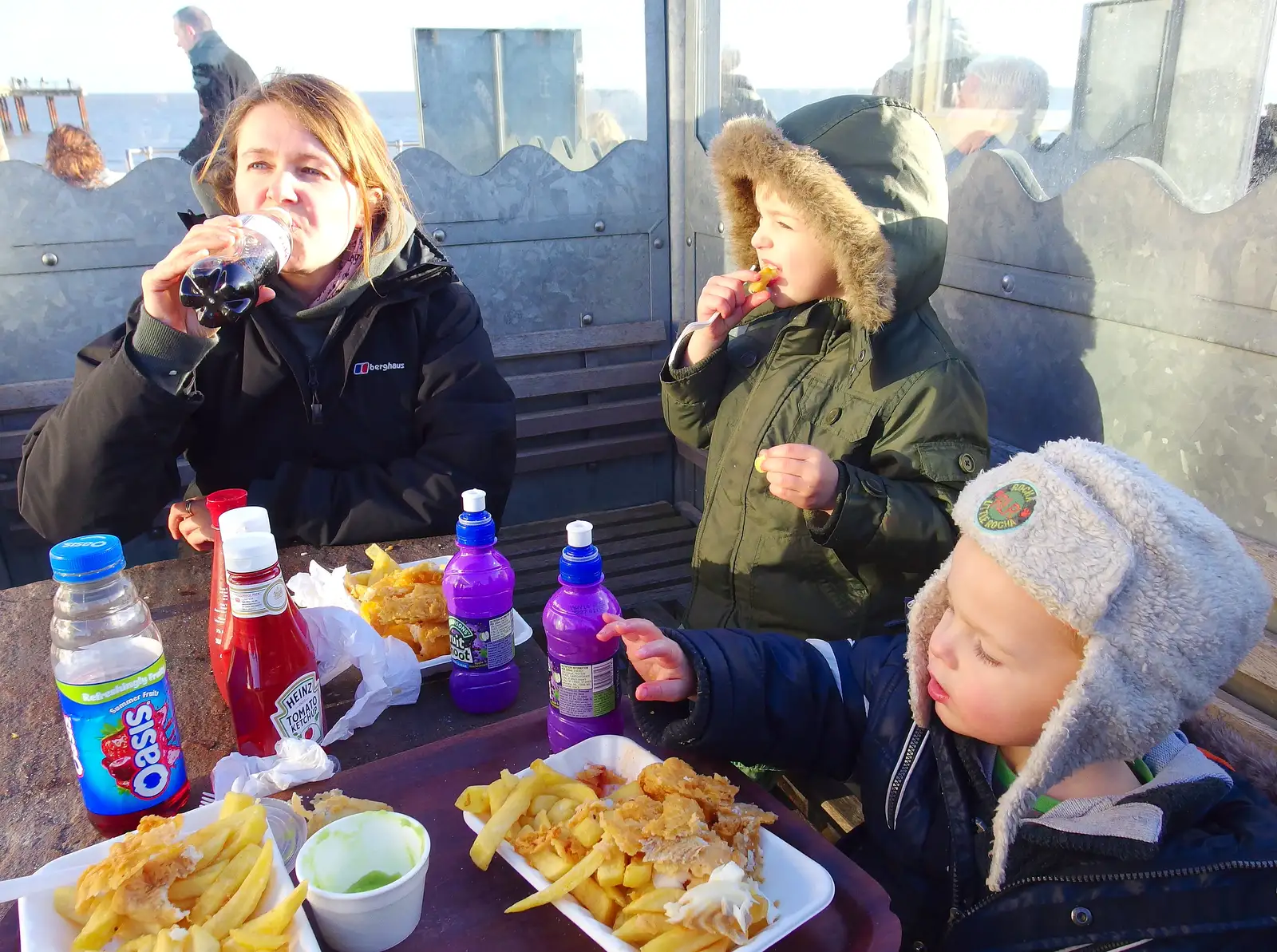 Eating Fish and Chips in the cold, from Post-Christmas Southwold, Suffolk - 29th December 2013