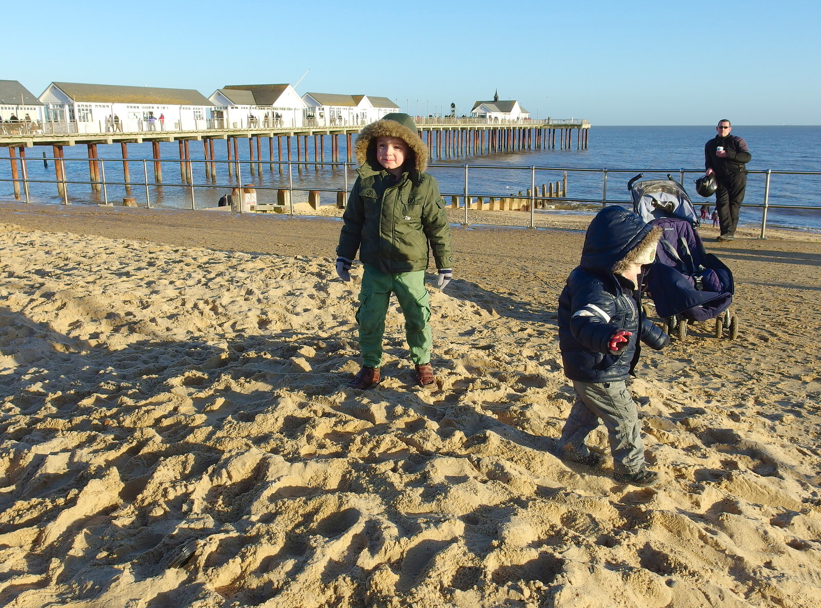 Fred and Harry roam around on the sand pile from Post-Christmas Southwold, Suffolk - 29th December 2013