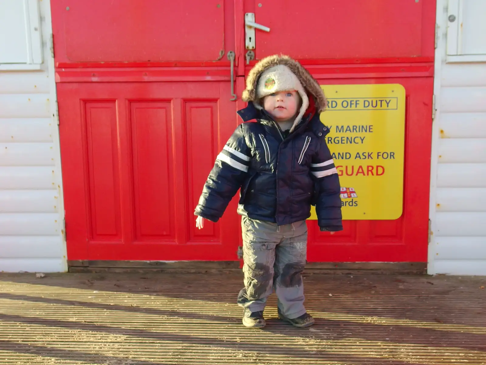 Harry peers out from under his hat, from Post-Christmas Southwold, Suffolk - 29th December 2013