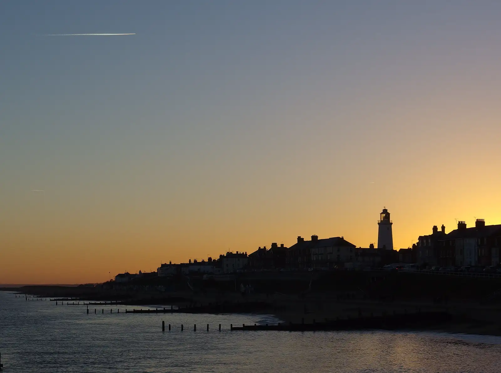 A plane flies high over Southwold, from Post-Christmas Southwold, Suffolk - 29th December 2013