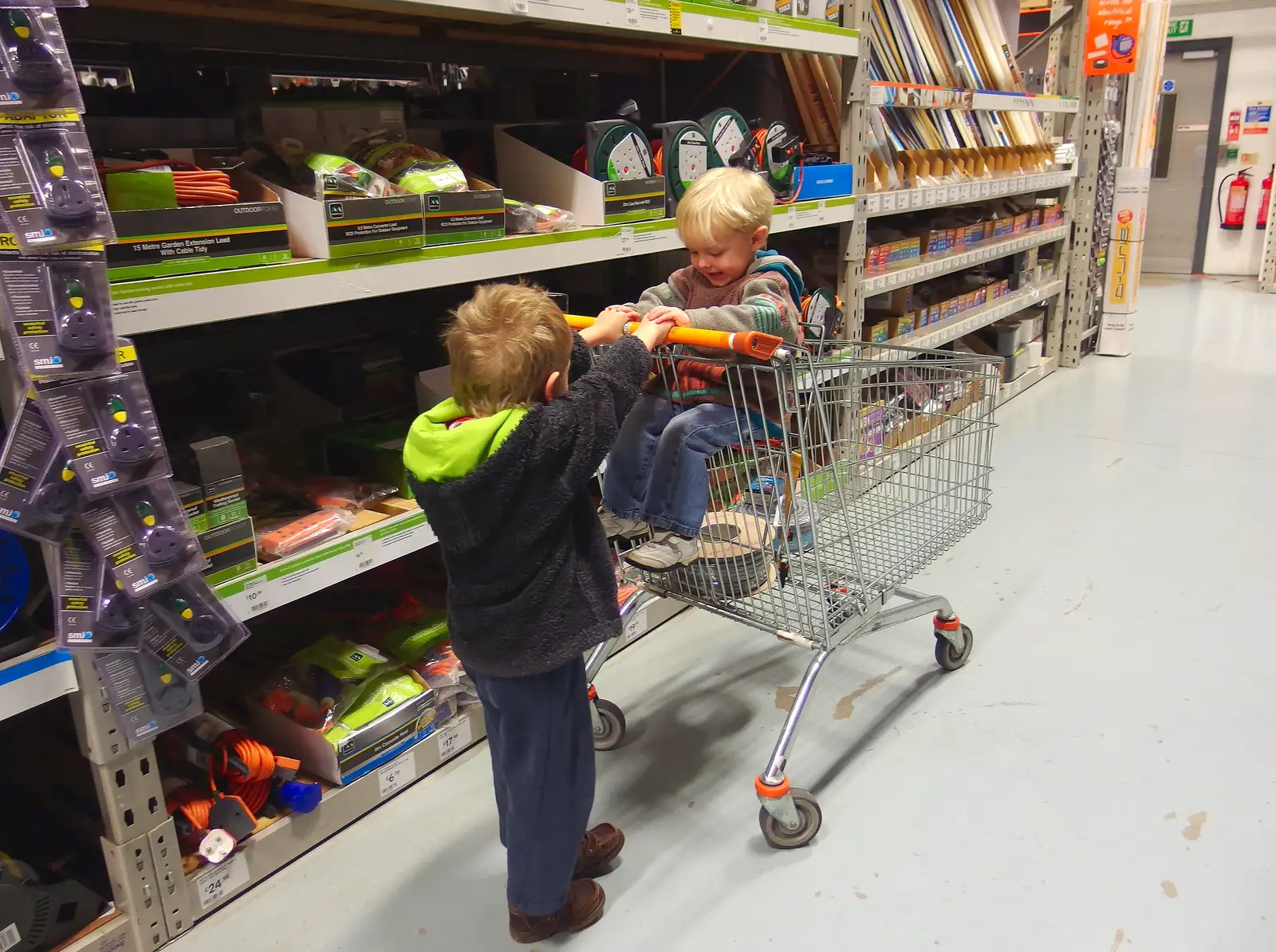 Fred and Harry in the electrical aisle, from The BBs Do New Year's Eve at the Barrel, Banham, Norfolk - 31st December 2013