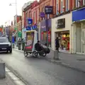 A cycling advert stops on the street, Dun Laoghaire and an Electrical Disaster, Monkstown, County Dublin, Ireland - 4th January 2014