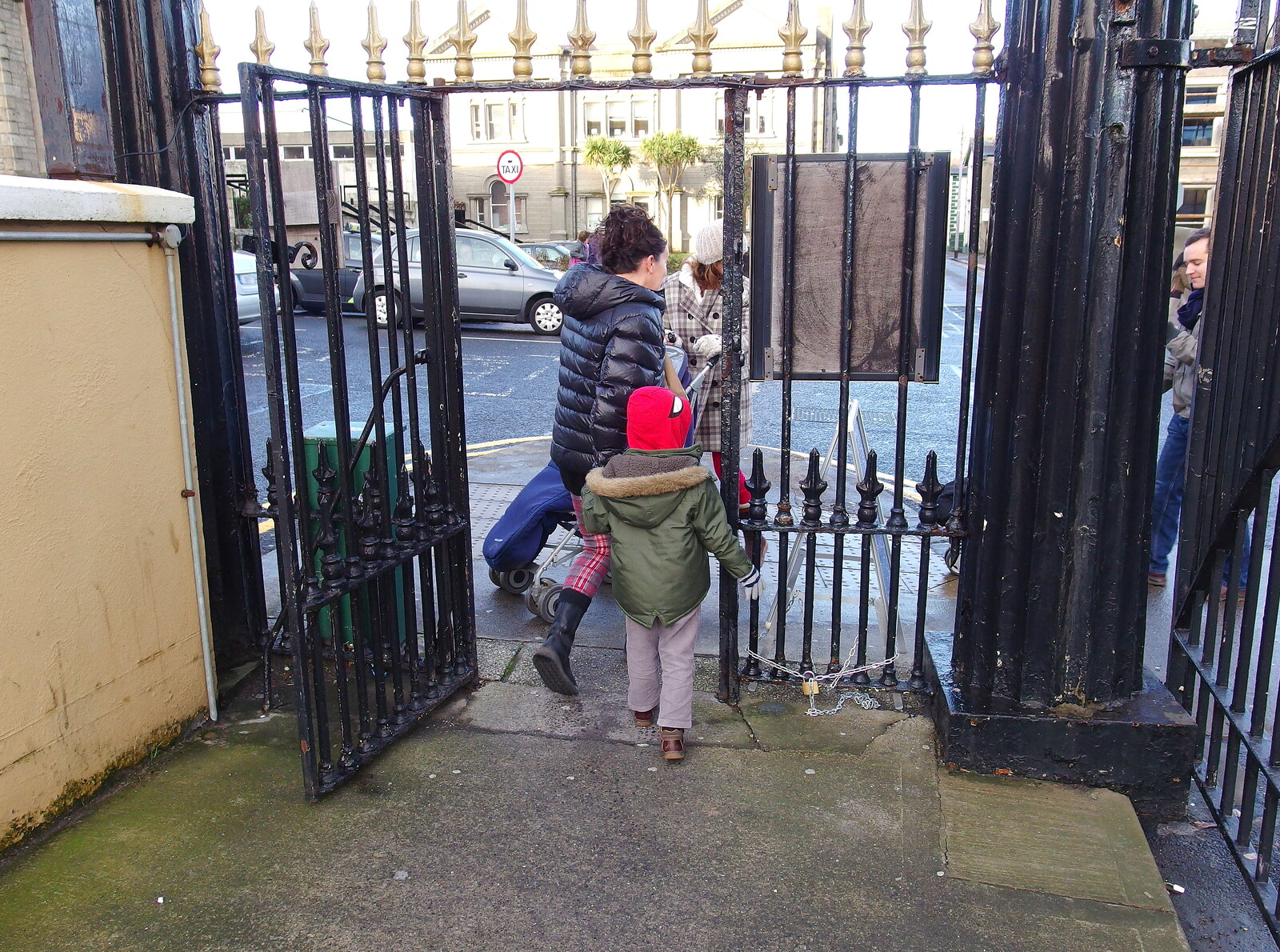 Evelyn and the gang head through an iron gate from Dun Laoghaire and an Electrical Disaster, Monkstown, County Dublin, Ireland - 4th January 2014
