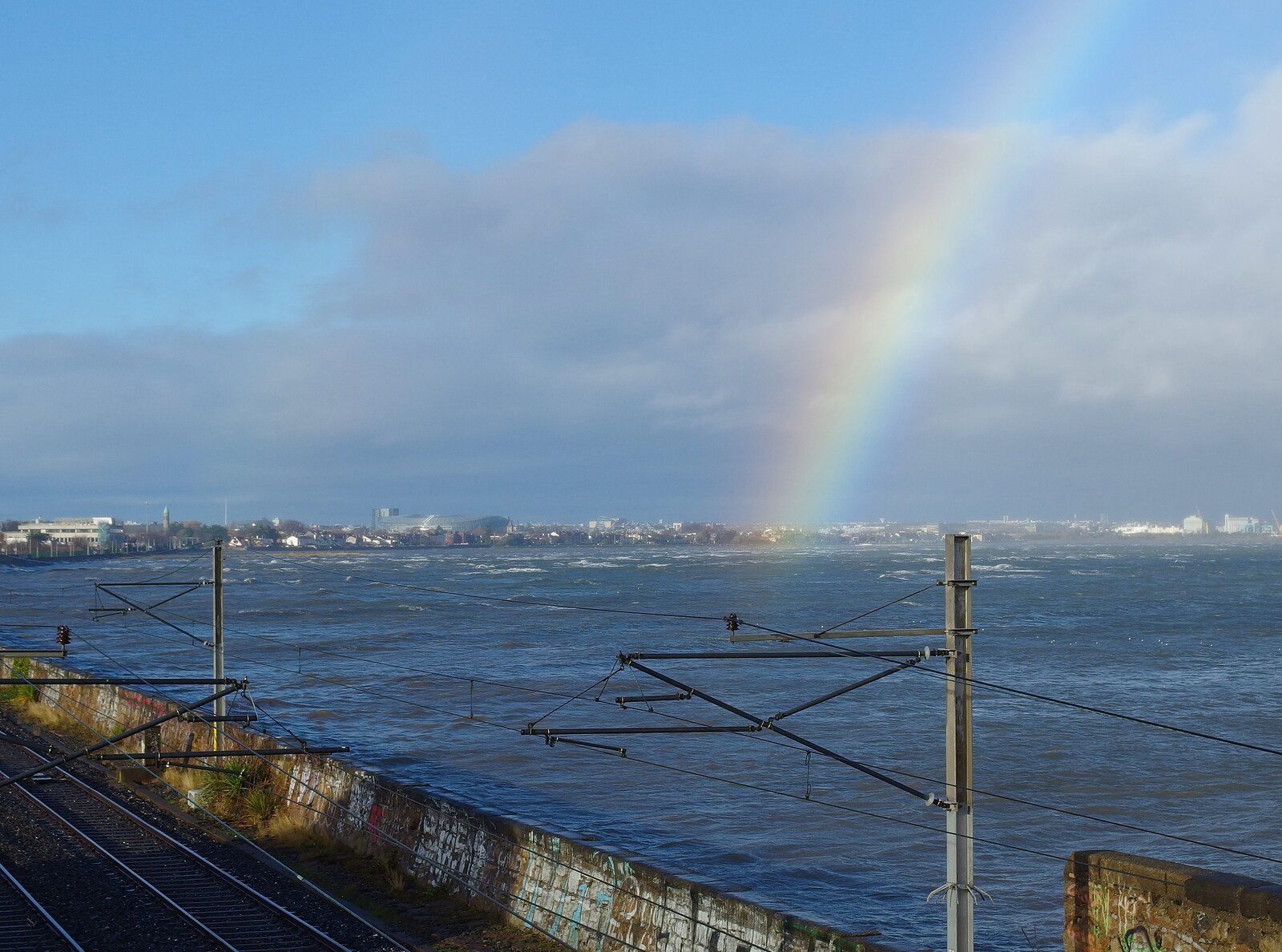 The rainbow seems to end on the DART pylon from Dun Laoghaire and an Electrical Disaster, Monkstown, County Dublin, Ireland - 4th January 2014