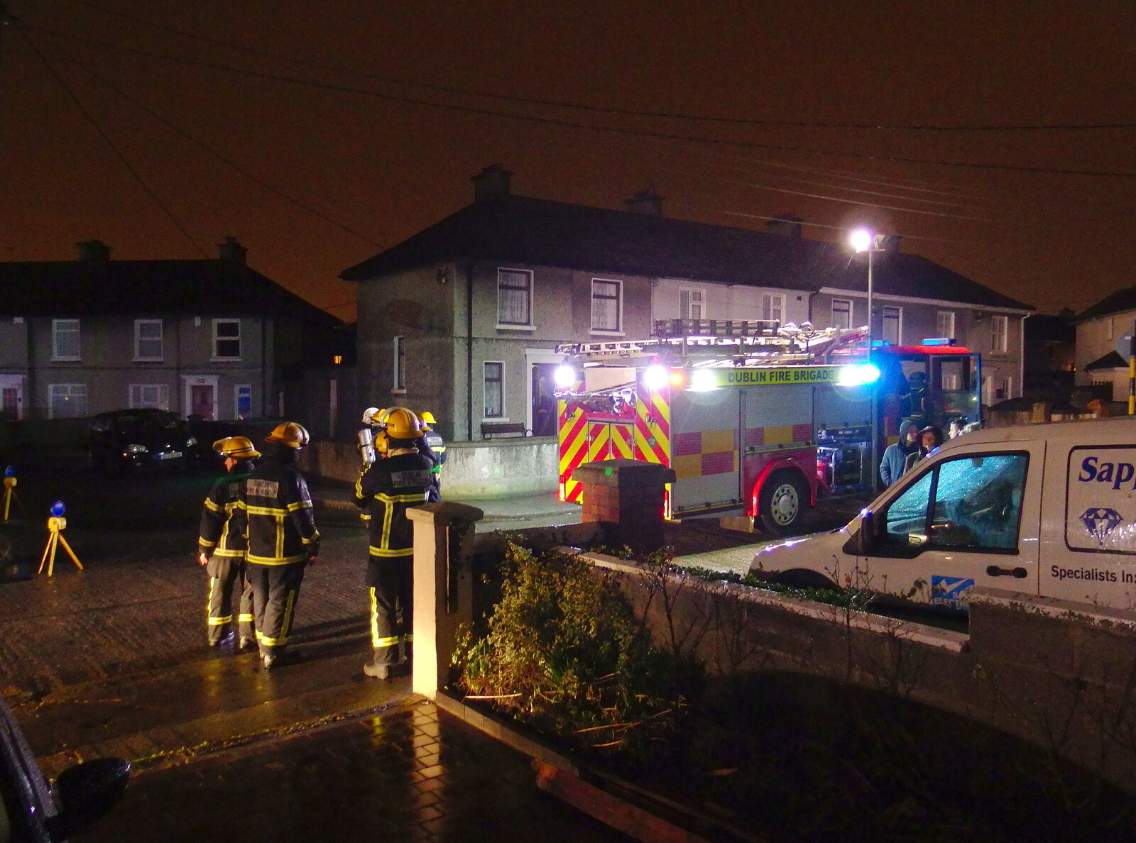 A bunch of firemen are outside the house from Dun Laoghaire and an Electrical Disaster, Monkstown, County Dublin, Ireland - 4th January 2014