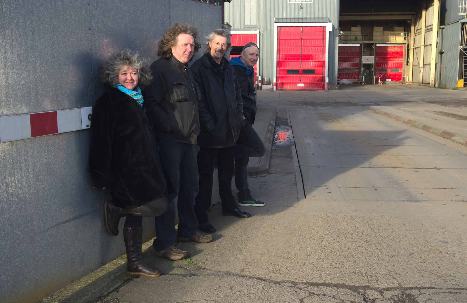 The band lean on a galvanised gate from The BBs Photo Shoot, BOCM Pauls Pavilion, Burston, Norfolk - 12th January 2014
